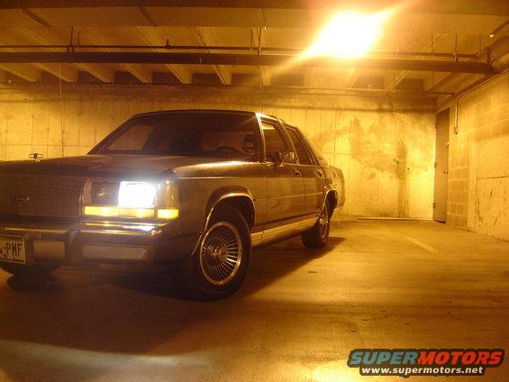 1988 Ford Crown Victoria LTD parked in a garage