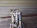 1999 Honda CR250R - The front suspension components of a motorcycle are shown, a 2004 California Off-Highway registration sticker.