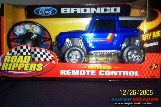 Blue Ford Bronco remote control toy in its box with a steering wheel controller