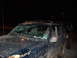 1996 Jeep Cherokee - Mud-covered 1996 Jeep Cherokee shows a cracked windshield and a second vehicle behind it.
