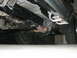 1989 Ford Bronco - Undercarriage view showing running boards and frame components, not the full vehicle.