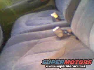 Interior seats and seatbelts. Text reads SUPERMOTORS