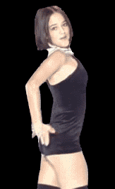 Woman in a black dress and thigh-high stockings posing against a black background