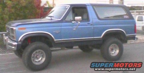 Blue 1984 Ford Bronco side view with lifted suspension