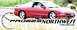 1997 Mitsubishi Eclipse - A red coupe is shown from the side, aftermarket wheels and a Probes Northwest logo overlay.