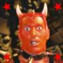 Devil mask with horns and red stars in background