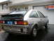 1983 Volkswagen Scirocco - The rear of a silver Volkswagen Scirocco is visible, showing its taillights, spoiler, and license plate.