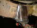 1982 Nissan Titan - A close-up view of a welded reinforcement on a rusty truck frame shows recent modifications.
