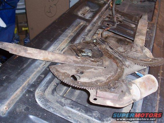 Window mechanism and motor removed. Engine degreaser and dielectric grease will make these things look brand new.  
