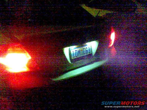 Car rear at night, license plate LDM C61 visible