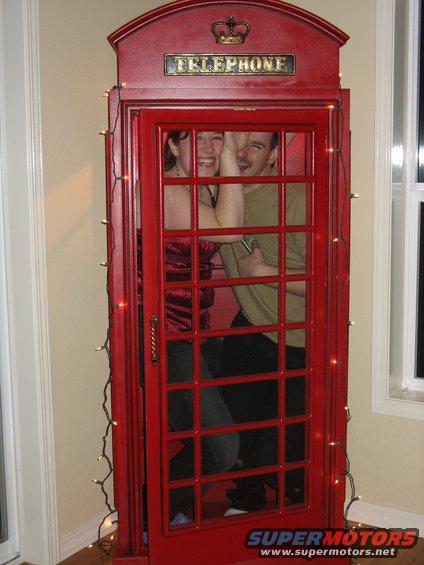 new-years08.jpg Me & Allen in the phone booth