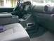 2001 Dodge 1500 - The interior of a truck shows the center console with aftermarket electronics and a GPS unit mounted on the dashboard.
