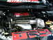 1986 Ford Bronco - Engine bay details with prominent TRD branding and a supercharger system.