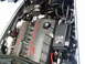 1986 Ford Bronco - Close-up of a Corvette LS1 engine, showing valve covers and intake manifold.