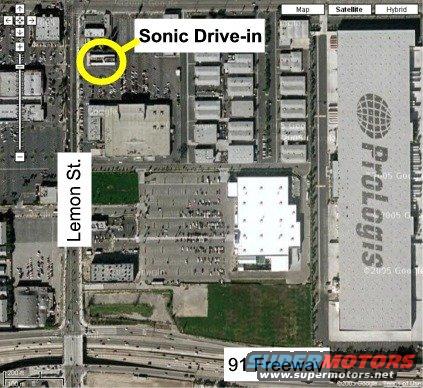 Aerial view of Sonic Drive-in and surrounding commercial buildings