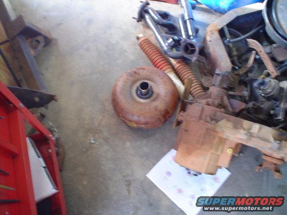Vehicle transmission and torque converter on a concrete floor
