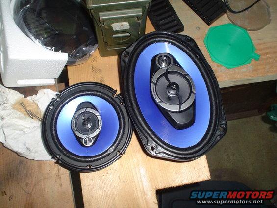 Two oval car speakers with blue cones and Pioneer branding