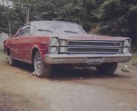 Red 1966 Ford Galaxie front view with horizontal grille