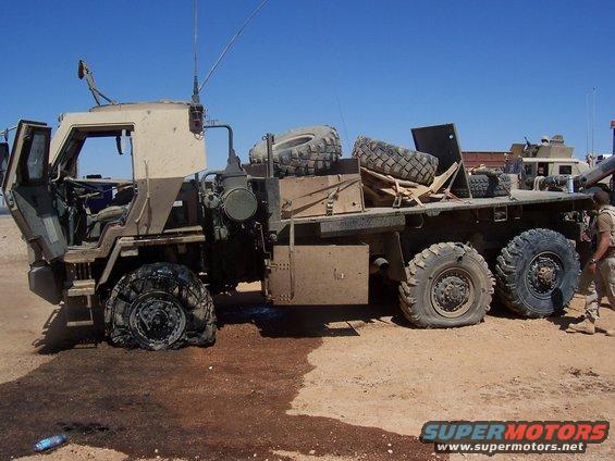 Army 5-ton after sustaining IED damage. These trucks took a blast well thanks to the armor.  
