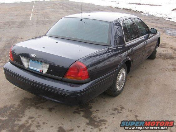 Dark blue 1999 Ford Crown Victoria rear view