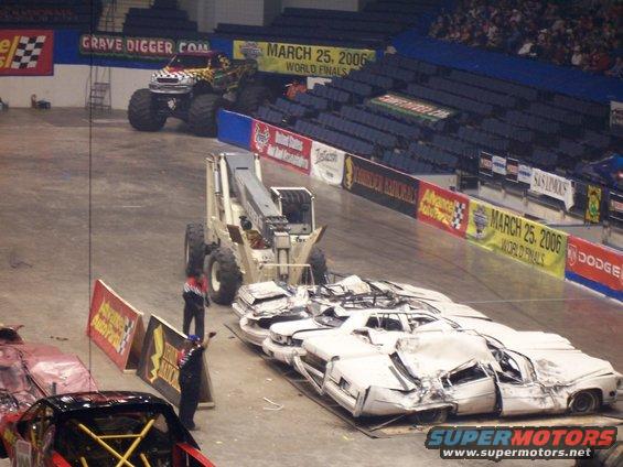 Monster truck Grave Digger at March 25, 2006 World Finals with crushed cars on the arena floor