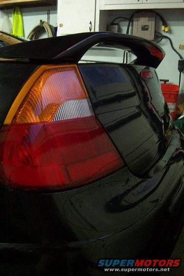 black car's rear spoiler and taillight assembly