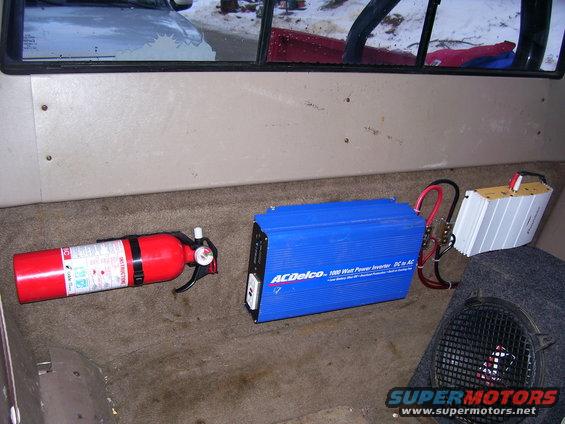 Another view of amp/inverter under rear slider window.