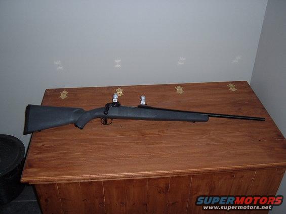Rifle on wooden chest
