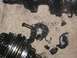 1996 Ford Probe - Transmission gears are heavily damaged, with significant breakage and metal debris visible.