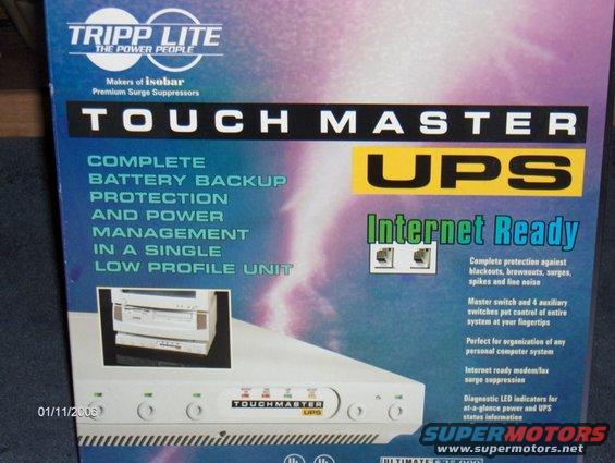 Tripp Lite Touch Master UPS box with text and product image