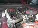 2001 Dodge 1500 - The engine bay of a 2001 Dodge 1500 shows various components and wiring with the hood open.