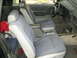 1985 Ford Mustang - Interior view of a 1985 Ford Mustang, front seats and dashboard details.