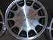 1999 Ford Taurus - Close-up of a Ford wheel with the oval Ford logo visible on the center cap.