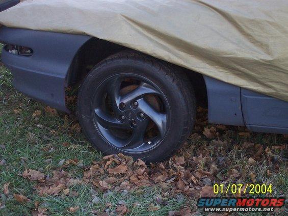 a crappy shot of my powder coated wheels, theyll be up for sale soon probably. there a little dirty in the pic but they have literally 0 miles on them