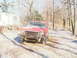 1984 Ford Bronco - A red pickup truck sits in a yard with snow on the ground and trees in the background.