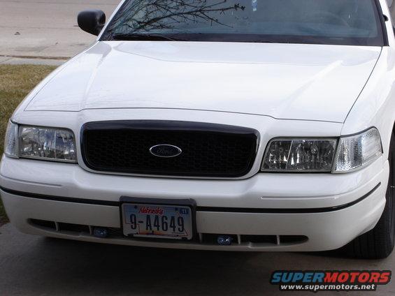 2000 Ford Crown Victoria front end with Nebraska license plate 9-A4649