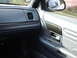 2000 Ford Crown Victoria - Interior view of a 2000 Ford Crown Victoria, showing the door panel and dashboard details.