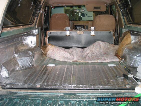 89-bronco-back-end.jpg Here is the cargo area with both side panels done and half of the floor