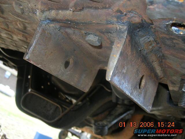 truck-016.jpg This if the front spring hangers, made from the old channel crossmember we put in when the TTB was still there. Had to grind the piss out of the inside walls to get the shackles in.