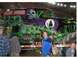 1976 Ford F-150 - The Grave Digger monster truck is displayed with custom artwork and a crowd.