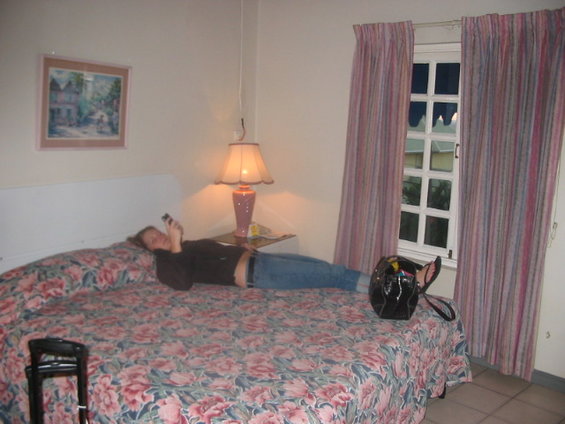 Person on bed with phone