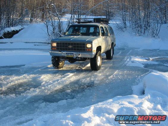 Chevy K5 Blazer driving on ice and snow, front view