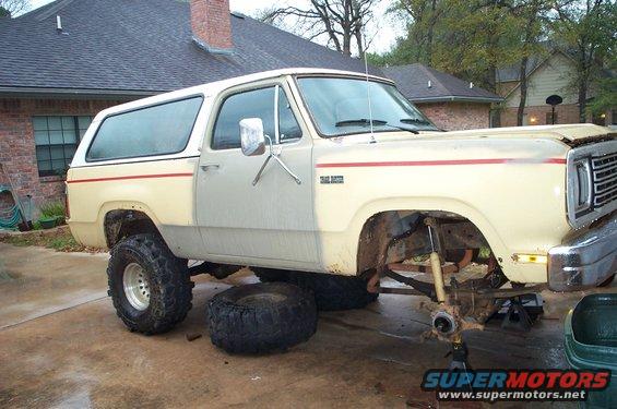 1978 Dodge Power Ram with front end disassembled, one tire removed