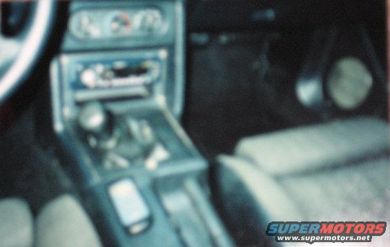 1990 Ford Mustang interior with automatic shifter and dashboard