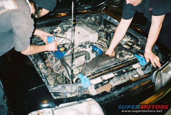 9093930r10219.jpg ...getting back together. added a Typhoon intake, 70mm T.B., EGR delete kit, 24lb injertors, 70mass air & cold air intake.  That took me out of the 14's into 13's!!! :)