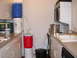 1995 Ford Bronco - A home brewing setup is arranged on a kitchen counter, stacked coolers and tubing for liquid transfer.