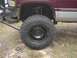 2001 Dodge 1500 - This truck has large off-road tires and a custom bumper, suggesting it's not a standard 2001 Dodge 1500.
