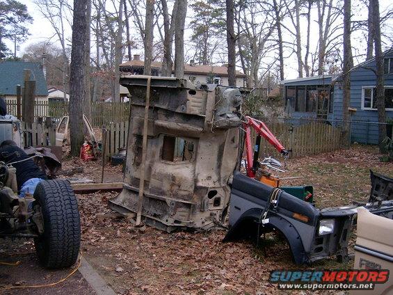 f250-cab-on-bronco-frame-015.jpg cab on side after being removed from F250 frame