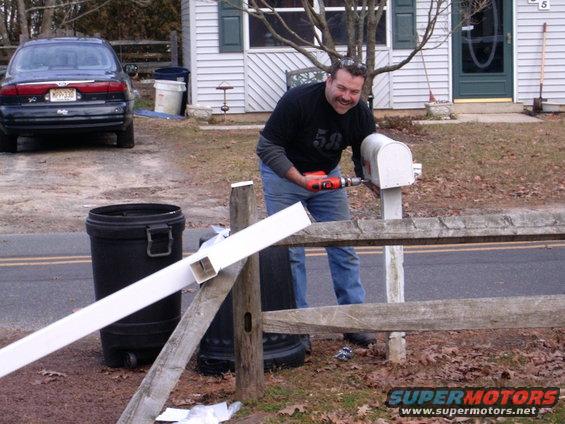 f250-cab-on-bronco-frame-022.jpg Runomuk (Jim) Fixin the mailbox he broke on the cab scrap day