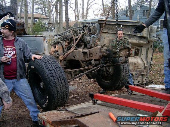gettin the rollin chasis on the trailer to have the last of the parts removed then it can get scraped